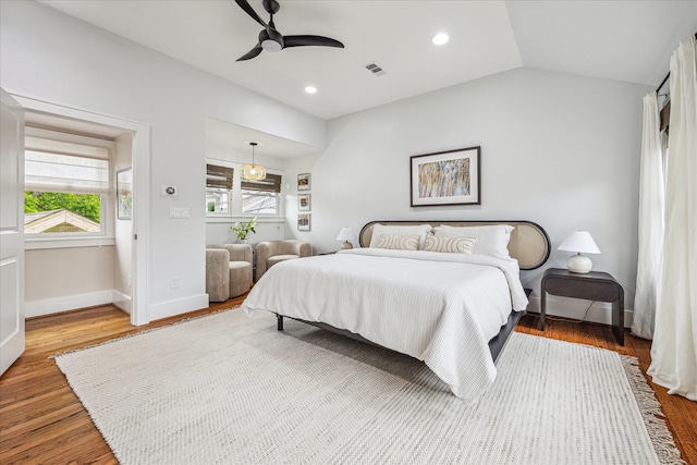 813 Key St, Houston, TX 77009 - bedroom featuring wood finished floors, baseboards, lofted ceiling, ceiling fan, and recessed lighting