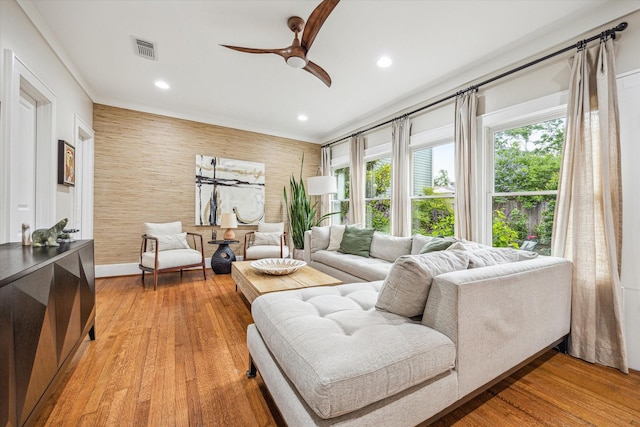 living area featuring ceiling fan, light wood-type flooring, recessed lighting, and baseboards