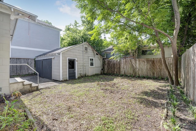 710 Woodland St, Houston, TX 77009 - fenced backyard featuring an outbuilding