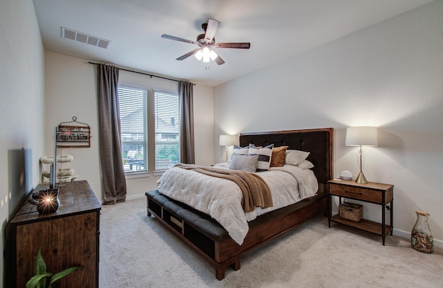7111 Pondhawk Dr, Katy, TX 77493 - carpeted bedroom with baseboards and a ceiling fan