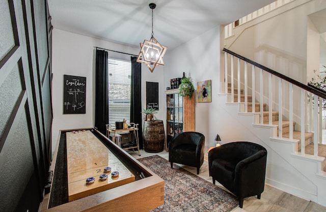 7111 Pondhawk Dr, Katy, TX 77493 - rec room with a chandelier and wood finished floors