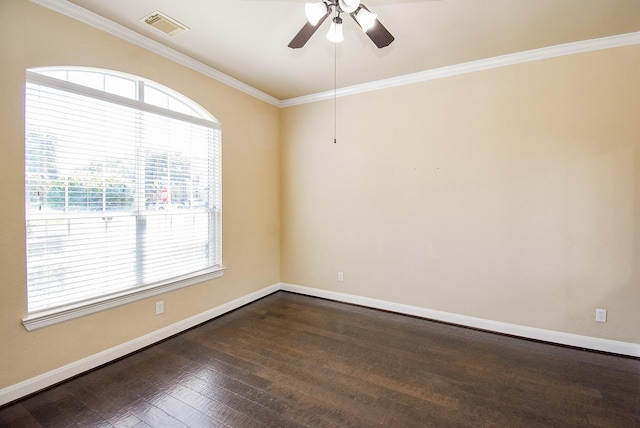 7003 Paxton Ct, Sugar Land, TX 77479 - unfurnished room with baseboards, dark wood-type flooring, a ceiling fan, and ornamental molding