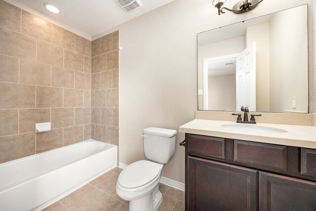 27106 Cottage Stream Ln, Fulshear, TX 77441 - bathroom with toilet, tile patterned flooring, vanity, baseboards, and shower / washtub combination