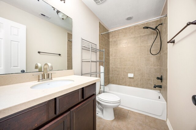 27106 Cottage Stream Ln, Fulshear, TX 77441 - full bath featuring tile patterned floors, bathtub / shower combination, toilet, and vanity