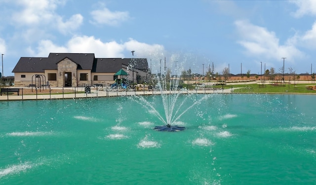 view of pool with fence