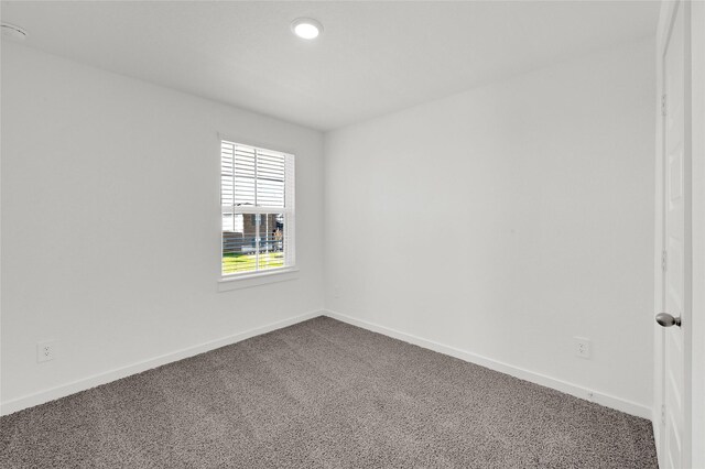 3907 Knighton Ct, Fulshear, TX 77441 - unfurnished room with dark colored carpet, baseboards, and recessed lighting