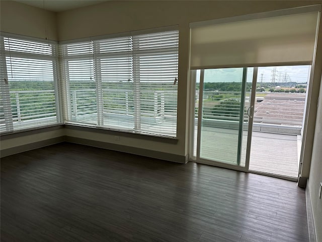 6955 Turtlewood Dr Unit 602, Houston, TX 77072 - spare room with dark wood finished floors and baseboards