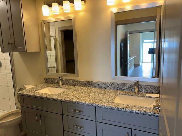 6955 Turtlewood Dr Unit 602, Houston, TX 77072 - full bathroom with double vanity and toilet