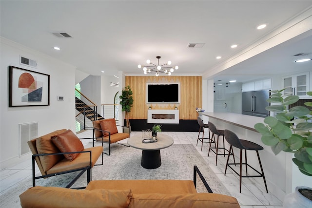 140 S Timber Top Dr, Spring, TX 77380 - living room featuring crown molding, stairway, a chandelier, recessed lighting, and baseboards