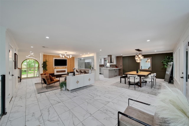 140 S Timber Top Dr, Spring, TX 77380 - living room featuring a chandelier, recessed lighting, crown molding, and light marble finish flooring