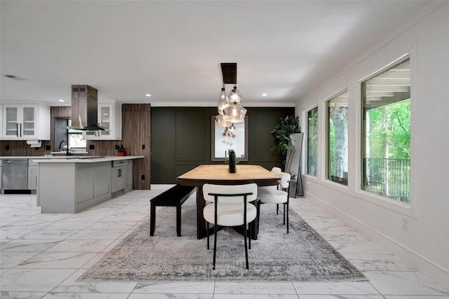 140 S Timber Top Dr, Spring, TX 77380 - dining room with light marble finish floors, recessed lighting, and baseboards