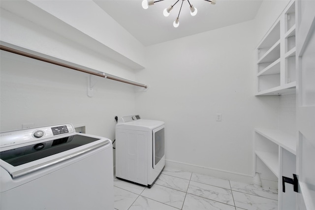 140 S Timber Top Dr, Spring, TX 77380 - laundry area featuring light marble finish flooring, independent washer and dryer, and baseboards
