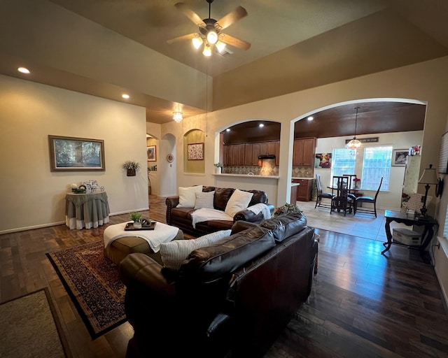 3002 Sandleigh Dr, Spring, TX 77388 - living area featuring arched walkways, a ceiling fan, wood finished floors, baseboards, and recessed lighting
