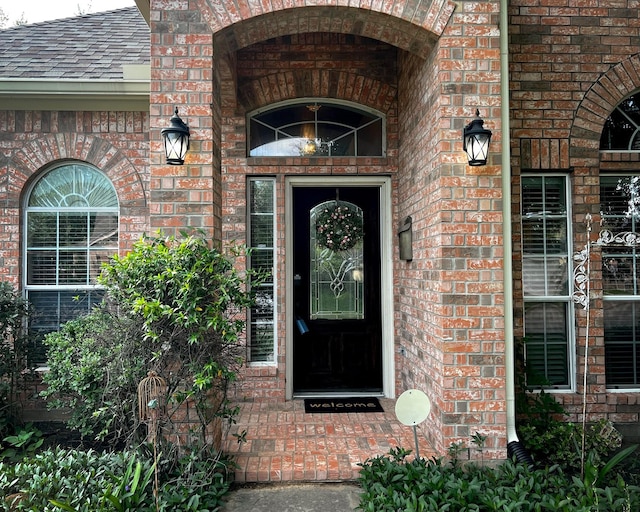 3002 Sandleigh Dr, Spring, TX 77388 - doorway to property with brick siding and a shingled roof