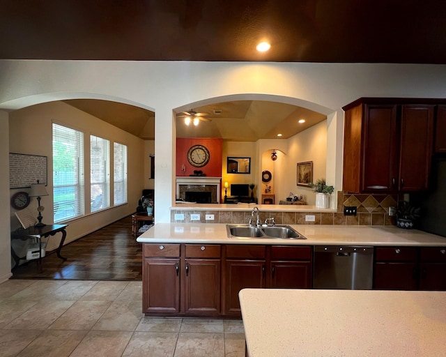 3002 Sandleigh Dr, Spring, TX 77388 - kitchen with dishwasher, a sink, a fireplace, light countertops, and recessed lighting