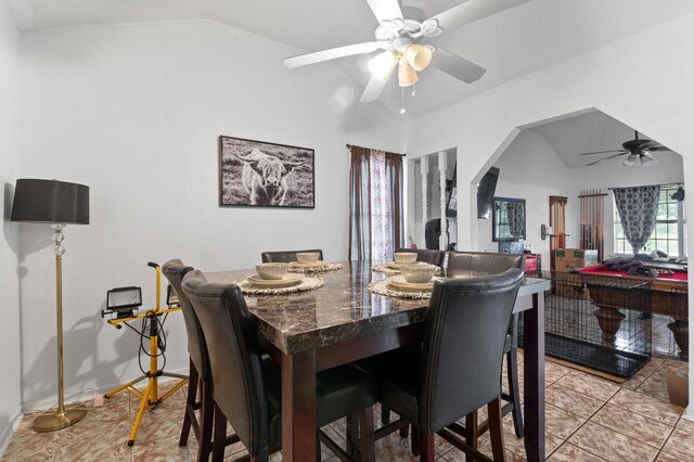 4914 Airport Blvd, Houston, TX 77048 - dining room featuring ceiling fan, vaulted ceiling, and light tile patterned floors