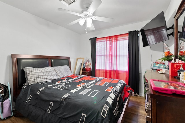 4914 Airport Blvd, Houston, TX 77048 - bedroom featuring wood finished floors and a ceiling fan