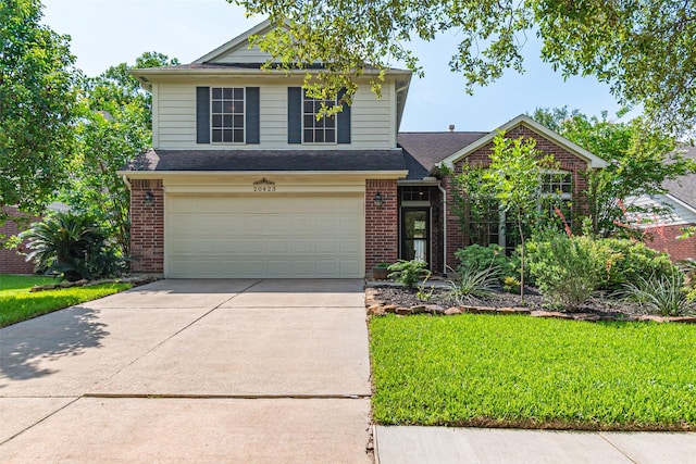 20423 Lone Star Oak St, Cypress, TX 77433 - view of front facade featuring driveway, a garage, brick siding, and a front lawn