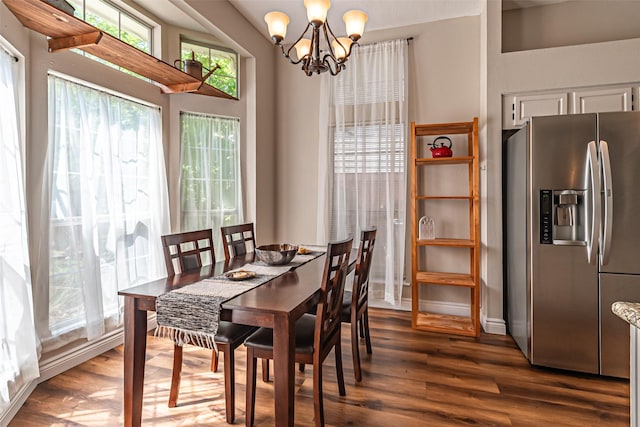 20423 Lone Star Oak St, Cypress, TX 77433 - dining room featuring dark wood-type flooring, a chandelier, and baseboards