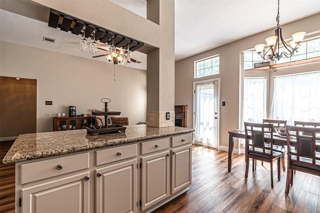 20423 Lone Star Oak St, Cypress, TX 77433 - kitchen with dark wood-style floors, ceiling fan, a chandelier, and pendant lighting
