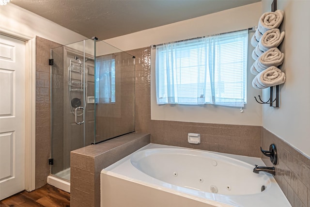 20423 Lone Star Oak St, Cypress, TX 77433 - full bathroom featuring a shower stall, a tub with jets, and wood finished floors
