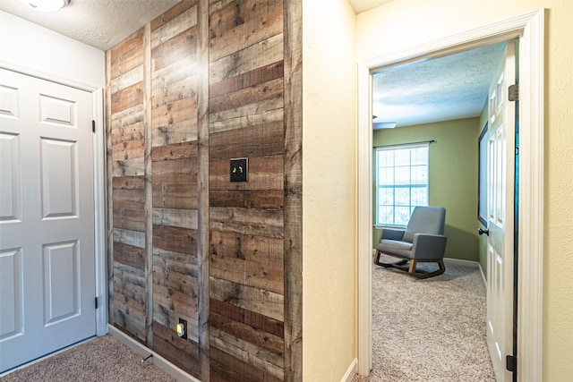 20423 Lone Star Oak St, Cypress, TX 77433 - hallway featuring a textured ceiling and carpet flooring