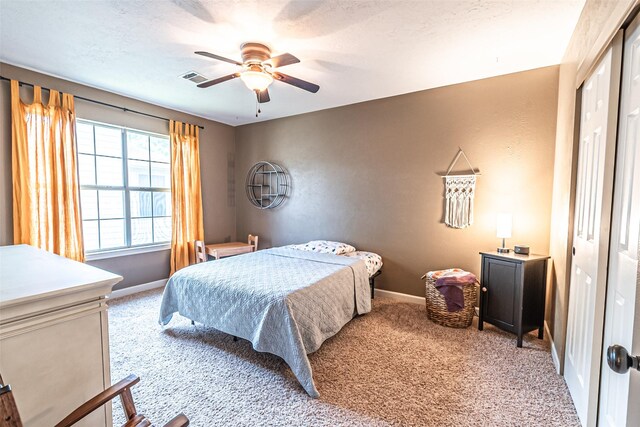 20423 Lone Star Oak St, Cypress, TX 77433 - bedroom with light colored carpet, baseboards, ceiling fan, and a closet