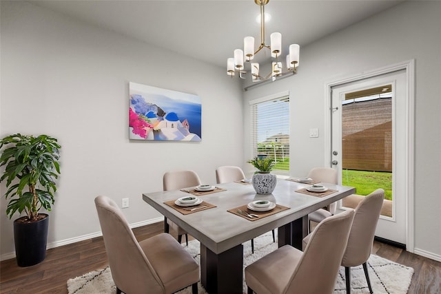 4438 Andorno Dr, Katy, TX 77449 - dining space featuring a chandelier, dark wood finished floors, and baseboards
