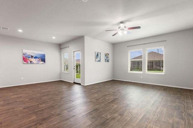 4438 Andorno Dr, Katy, TX 77449 - spare room with plenty of natural light, a ceiling fan, dark wood-style floors, baseboards, and recessed lighting