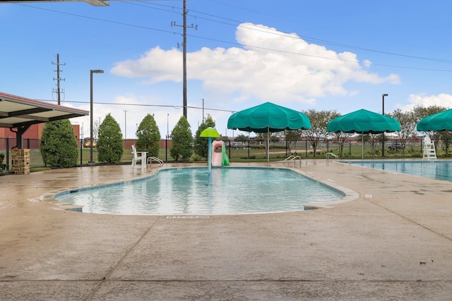 4438 Andorno Dr, Katy, TX 77449 - community pool featuring fence and a patio