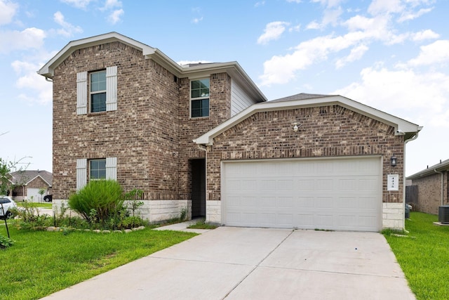 4438 Andorno Dr, Katy, TX 77449 - traditional-style home with brick siding, driveway, a garage, and a front yard