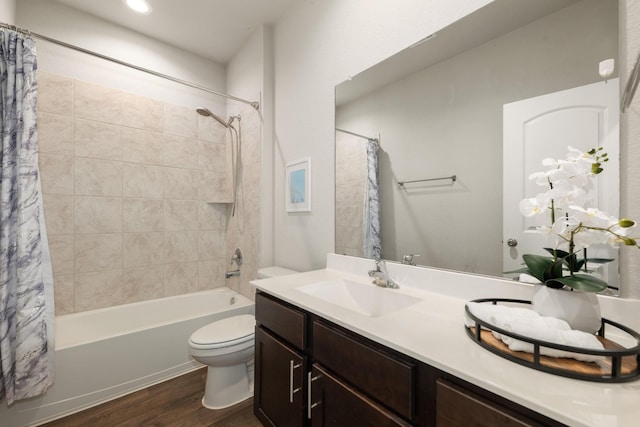 4438 Andorno Dr, Katy, TX 77449 - bathroom with wood finished floors, toilet, shower / bath combo, and vanity