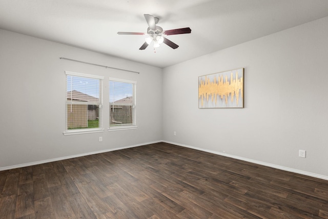 4438 Andorno Dr, Katy, TX 77449 - empty room with a ceiling fan, dark wood-type flooring, and baseboards