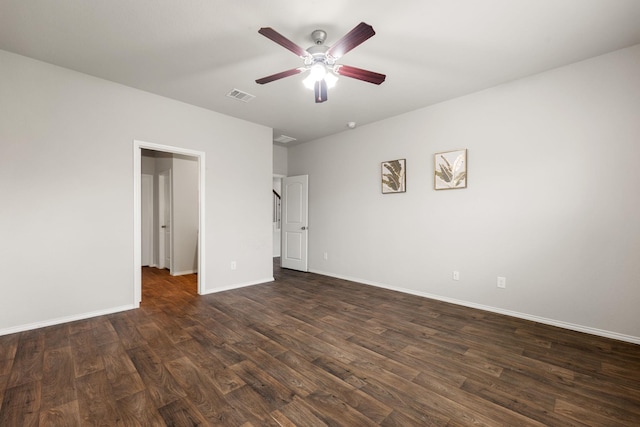 4438 Andorno Dr, Katy, TX 77449 - unfurnished bedroom featuring dark wood-style floors, baseboards, and a ceiling fan