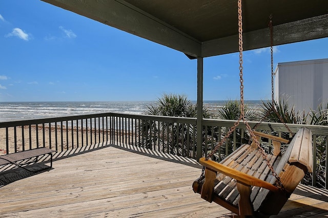 4242 Pelican Ln, Galveston, TX 77554 - deck featuring view of water and beach