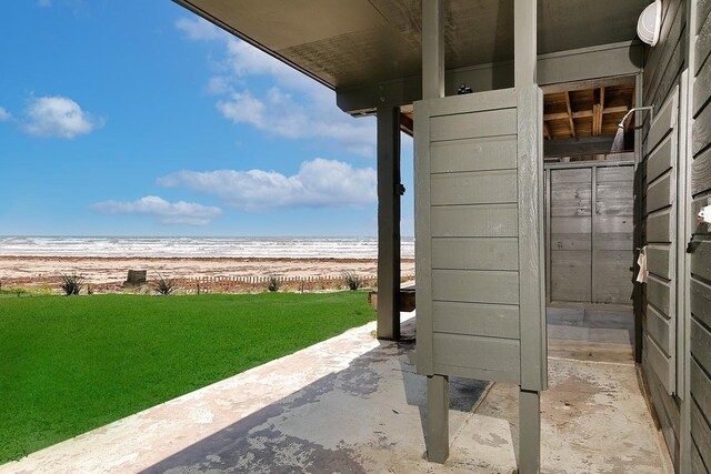 4242 Pelican Ln, Galveston, TX 77554 - view of patio featuring view of water and beach