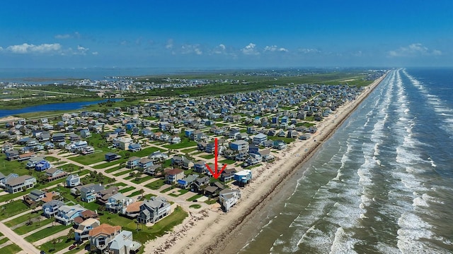 4242 Pelican Ln, Galveston, TX 77554 - aerial perspective of suburban area featuring waterfront with a beach