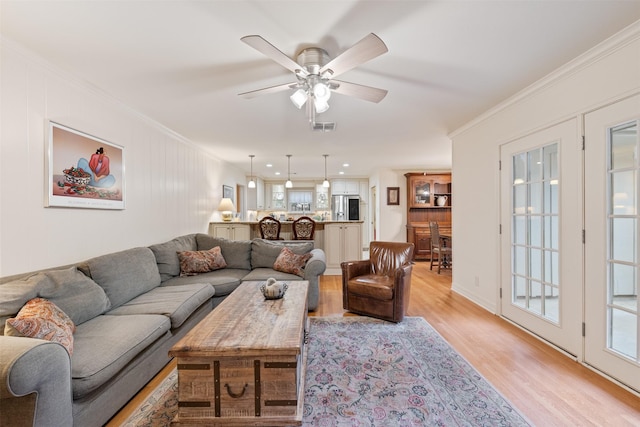 7906 Meadow Lake Ln, Houston, TX 77063 - living room featuring ornamental molding, light wood finished floors, and ceiling fan