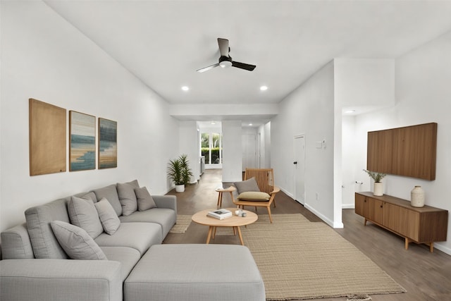 living room with ceiling fan, wood finished floors, recessed lighting, and baseboards