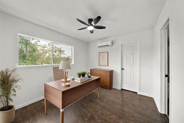 office featuring an AC wall unit, ceiling fan, dark wood finished floors, and baseboards