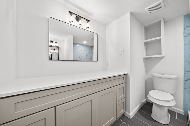 full bath featuring toilet, tile patterned floors, a marble finish shower, and baseboards