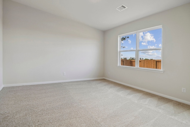 16449 Blossom Grove Dr, Conroe, TX 77303 - empty room with light carpet and baseboards