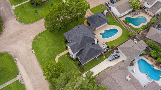 10830 Piping Rock Ln, Houston, TX 77042 - drone / aerial view of a pool