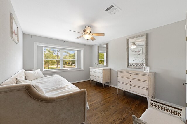 10830 Piping Rock Ln, Houston, TX 77042 - bedroom with dark wood-style flooring, baseboards, and a ceiling fan