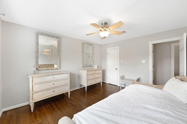 10830 Piping Rock Ln, Houston, TX 77042 - bedroom with baseboards, wood finished floors, and ceiling fan