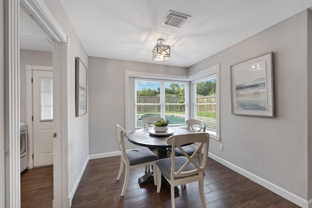 10830 Piping Rock Ln, Houston, TX 77042 - dining space with baseboards and dark wood finished floors