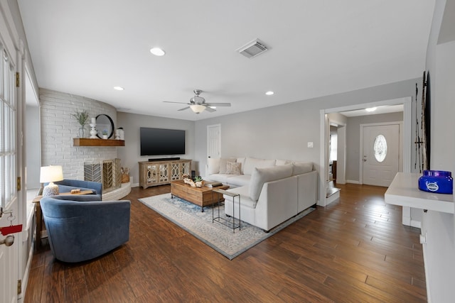 10830 Piping Rock Ln, Houston, TX 77042 - living room featuring ceiling fan, dark wood-type flooring, recessed lighting, baseboards, and a fireplace
