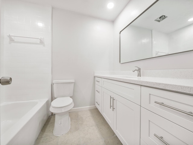 bathroom with toilet, vanity, baseboards, shower / washtub combination, and tile patterned flooring