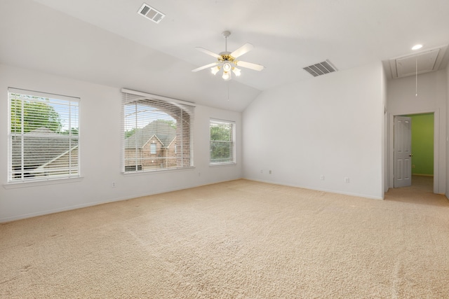 7615 Brae Acres Ct, Houston, TX 77074 - spare room featuring attic access, plenty of natural light, light colored carpet, lofted ceiling, and baseboards