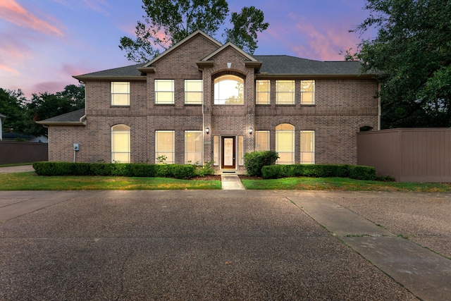 7615 Brae Acres Ct, Houston, TX 77074 - view of front facade with brick siding and fence